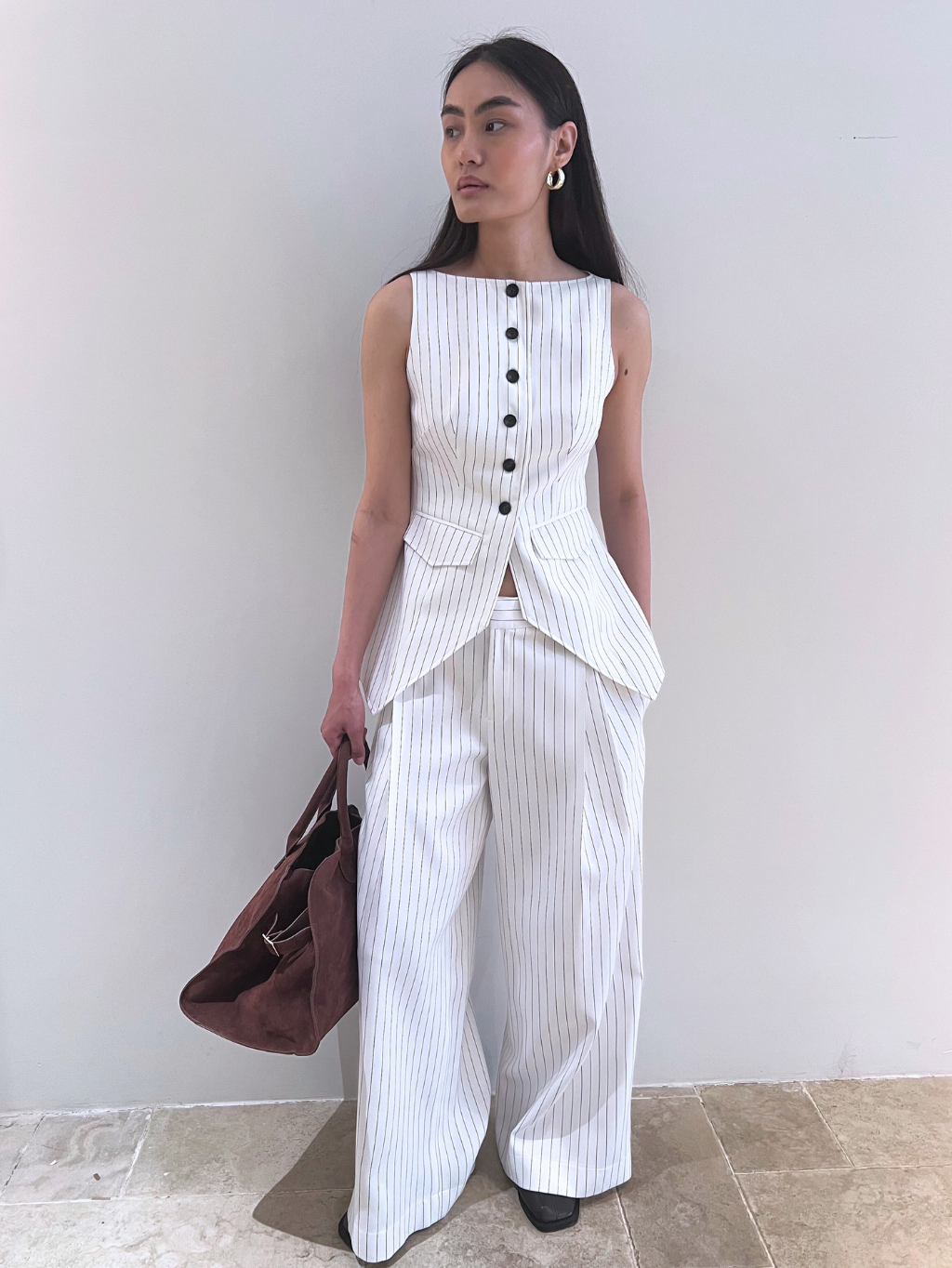 White Trousers With Black Stripes
